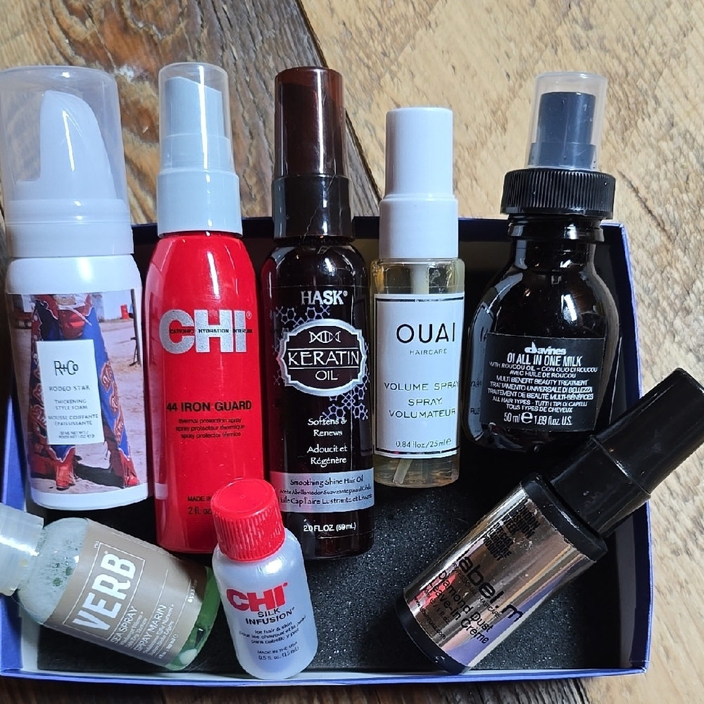 Mixed brand travel sized haircare styling product set.